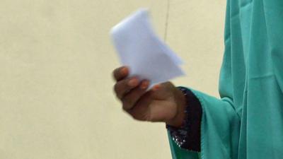 A woman voting in Somalia