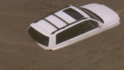 Cars is engulfed in an enormous mudslide