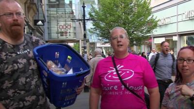 Family from Wigan handing out food and drink