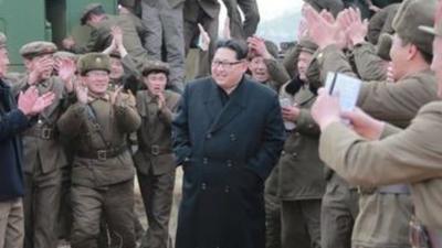 Picture released by North Korean news agency KCNA showed Kim Jong-un at what it said was the testing of a multiple launch rocket system