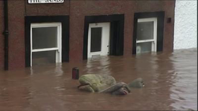 Flood water submerges street in Appleby, Cumbria