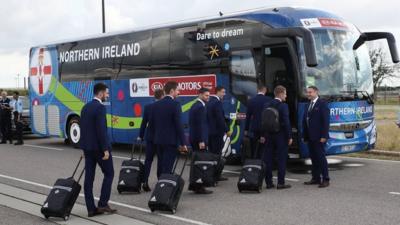 Members of the Northern Ireland team arriving in France