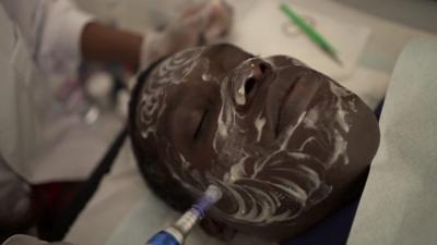 Seydina Alioune Djigo getting a facial