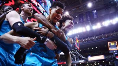 Jeremy Lamb celebrates with teammates