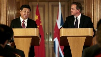 China's President Xi Jinping and Britain's Prime Minister David Cameron at a joint press conference