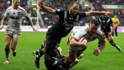 Elliot Whitehead scores his second try for England against New Zealand