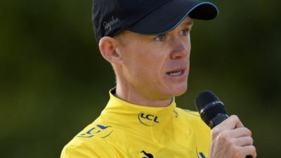 Chris Froome makes a speech after winning the Tour de France