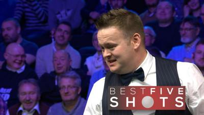 Best shots as Murphy eases into final