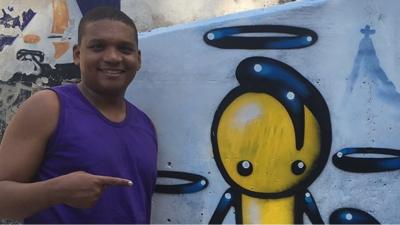 Wark Rocinha with his grafitti