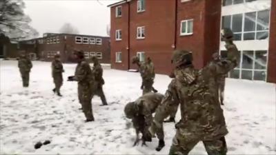 British military having fun in the snow