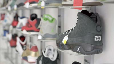 Sneakers or trainers on shelves