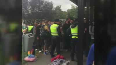 Migrants waiting to get on train in Austria