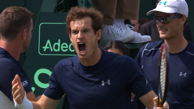 Andy (left) and Jamie Murray celebrate taking the third set