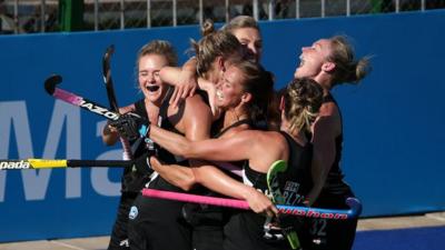 Olivia Merry of New Zealand celebrates scoring the winning goal with her team-mates