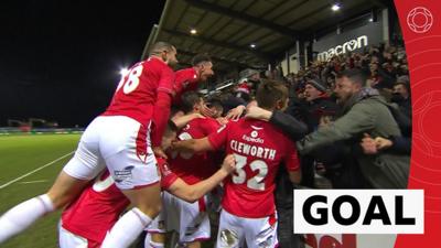 The Wrexham team celebrate their second goal against Sheffield United