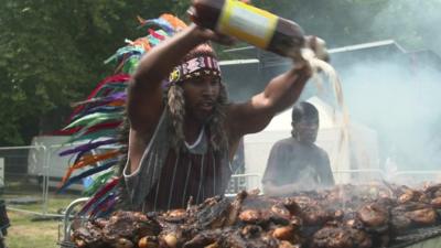 Chef cooking Caribbean food