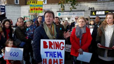 Richard Ratcliffe talks to demonstrators