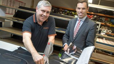 Ken Skates at the Orange Box company in Nantgarw