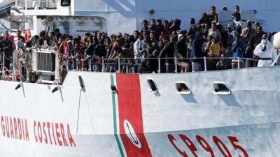 Migrants in an Italian Coastguard boat