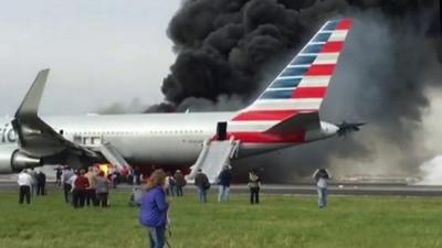 American Airline plane on fire at Chicago's O'Hare airport