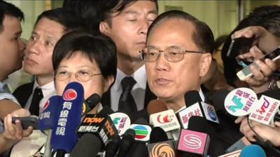 Donald Tsang outside court