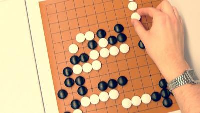 A man playing Go