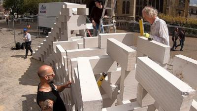 Dominoes team building blocks outside The Forum, Norwich