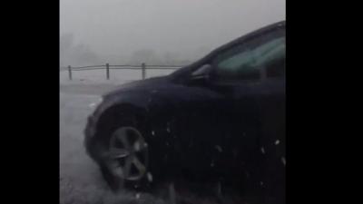 M9 car in hail