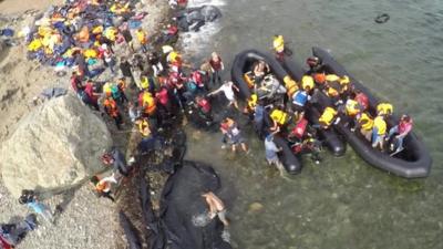 Aerial view of boats arriving at beach