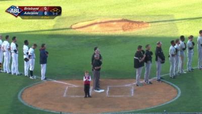 Boy singing national anthem