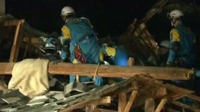 Rescuers in Kumamoto