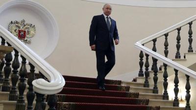 Vladimir Putin heading to his inauguration in Kremlin