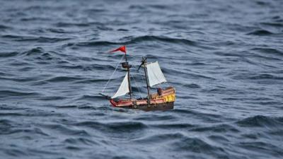 Toy ship in sea