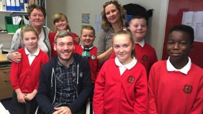 Martin with school children and teachers