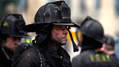 Emergency personnel respond to fire in Bronx borough of New York City