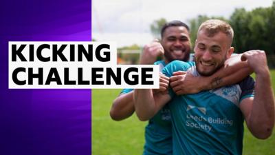 Jarrod O'Connor and Sam Lisone of the Leeds Rhinos take part in a kicking challenge