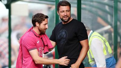 Joe Allen and Russell Martin of Swansea City