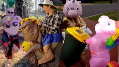 People dressed up to take their bins out