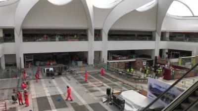 Workmen inside New Street station