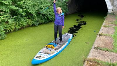 A woman on a paddleboard