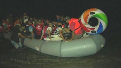 Boat of migrants arriving on Greek island Kos