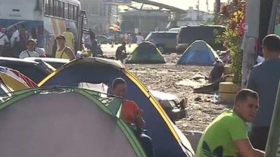 Cuban migrants have been staying in tents