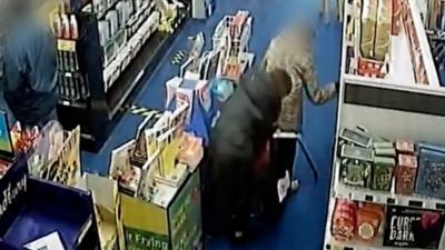 CCTV footage of a woman stealing another woman's handbag