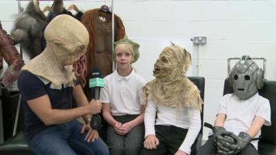 Ricky and children dressed in Doctor Who costumes