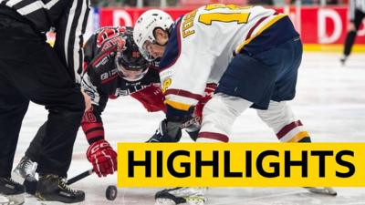 Jake Coughler of Cardiff Devils contests a face-off with Brett Ferguson of Guildford Flames