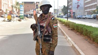 A Burkina Faso gendarme stands guard