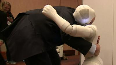 Rory Cellan-Jones hugging a robot
