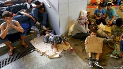 Migrants rest in an underground passage near to Keleti train starion in Budapest, Hungary