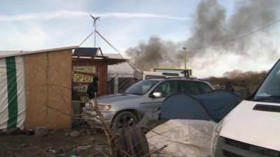 Smoke rises over Calais "Jungle"