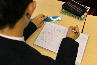 Child doing their exam